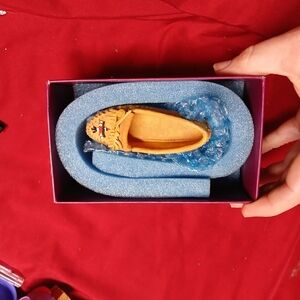 miniature collectible figurine called the "Brave Warrior" Moccasin, created by a